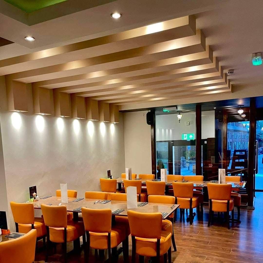 Restaurant refurbishment with timber slatted ceiling and new dining area